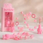 Présentoir de 12 : Gloss pour lèvres OURSON attaché au bracelet – Kevin & Coco