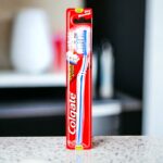 Lot de 12 : Brosse à dents double action - Colgate