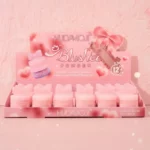 Présentoir de 24 :🎀 Poudre Blush B-148 HUDA MOJI - Fini Naturel, Légèreté & Tenue 12H ! ⏳